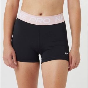Nike Pro Dri-Fit size large black with light pink waist